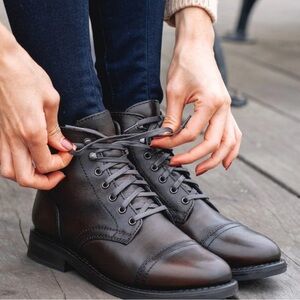 Black Coffee Heeled Boots with Cap Toe and Sleek Silhouette